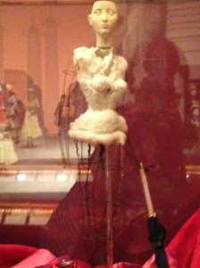 One of the glass cases in the Exhibit shows a "naked" mannequin, which gives one a good look at what the fashion designers and "petit mains" were working with while dressing them.